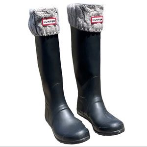 Hunter tall boots ready for serious snow, flooding, fishing. Ultimate rain gear.
